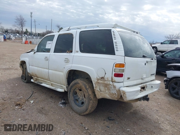 2003 Chevrolet Tahoe LT with VIN 1GNEK13Z53R121923, listed as a IAAI auction lot 41590696 with 1 mi miles. Bid and sale history available at carsss.com. Image 3.