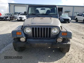 2002 Jeep Wrangler Sport с VIN 1J4FA49S02P734712, выставлен на аукционе Copart как лот 63310225 с пробегом 178 367 миль миль и Чистый • Clean title. История ставок и продаж доступна на DreamBid. Изображение 5.