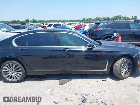 2021 BMW 7 Series 750i xDrive with VIN WBA7U2C05MCF83437, listed as a IAAI auction lot 42403572 with Not provided miles and . Bid and sale history available at DreamBid. Image 14.