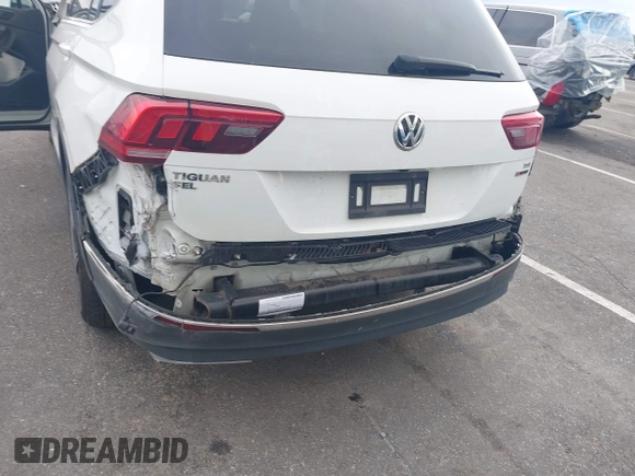 2018 Volkswagen Tiguan SEL with VIN 3VV2B7AX4JM012840, listed as a IAAI auction lot 42263511 with 105,510 mi miles and . Bid and sale history available at DreamBid. Image 17.