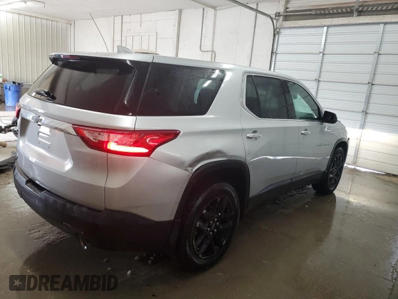2020 Chevrolet Traverse LS with VIN 1GNERFKW1LJ130830, listed as a Copart auction lot 61297324 with 97,301 mi miles and Salvage Title. Bid and sale history available at carsss.com. Image 3.