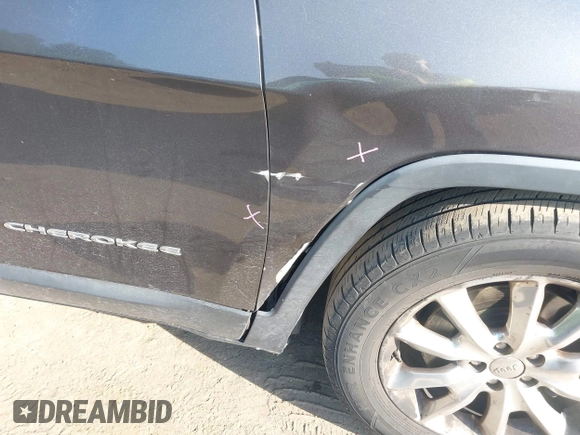 2015 Jeep Cherokee Limited with VIN 1C4PJMDB4FW610956, listed as a IAAI auction lot 42167270 with 118,219 mi miles and . Bid and sale history available at DreamBid. Image 18.