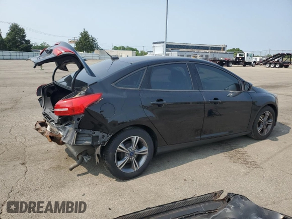 2018 Ford Focus SE z VIN 1FADP3F2XJL228407, wystawiony jako Copart lot #59254415 z przebiegiem 75 241 mil mil oraz Szkoda całkowita • Salvage title. Historia ofert i sprzedaży dostępna na DreamBid. Obrazek 3.
