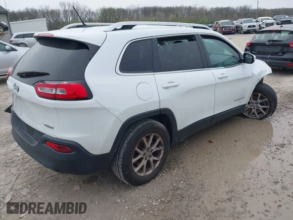 2014 Jeep Cherokee Latitude with VIN 1C4PJMCSXEW150735, listed as a IAAI auction lot 42020944 with 76,303 mi miles and . Bid and sale history available at carsss.com. Image 4.