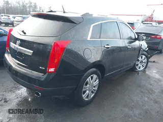 2013 Cadillac SRX Luxury Collection with VIN 3GYFNGE37DS629724, listed as a IAAI auction lot 41485910 with 151,977 mi miles. Bid and sale history available at carsss.com. Image 4.