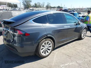 2018 Tesla Model X 75D with VIN 5YJXCBE26JF121937, listed as a IAAI auction lot 41652666 with 93,478 mi miles and . Bid and sale history available at carsss.com. Image 4.