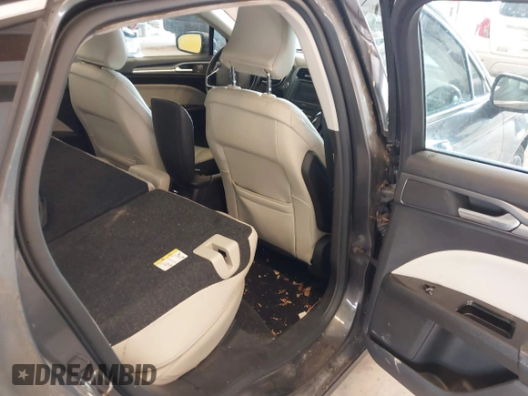 2016 Ford Fusion Titanium with VIN 3FA6P0D9XGR223354, listed as a IAAI auction lot 42621924 with Not provided miles and . Bid and sale history available at DreamBid. Image 8.