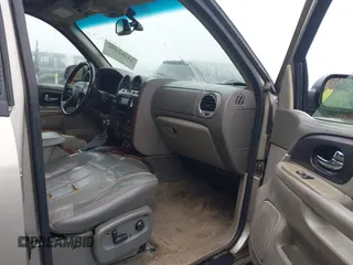 2002 GMC Envoy SLT with VIN 1GKDS13S322491528, listed as a IAAI auction lot 41482996 with 251,182 mi miles. Bid and sale history available at carsss.com. Image 5.