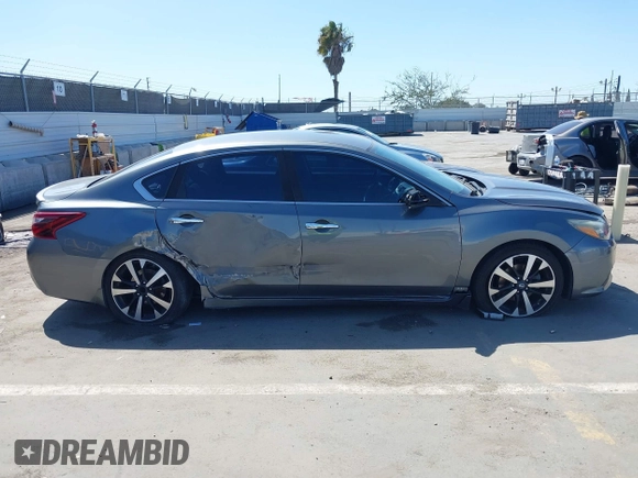 2018 Nissan Altima SR with VIN 1N4AL3AP6JC120402, listed as a IAAI auction lot 41949433 with 58,595 mi miles and . Bid and sale history available at carsss.com. Image 13.