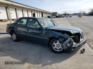 1995 Mercedes-Benz E Class with VIN WDBEA32E1SC242552, listed as a Copart auction lot 52433285 with 211,669 mi miles and Salvage Title. Bid and sale history available at carsss.com. Image 4.