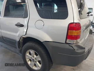 2006 Ford Escape XLT with VIN 1FMCU93126KC12711, listed as a IAAI auction lot 42659618 with 180,611 mi miles and . Bid and sale history available at DreamBid. Image 6.