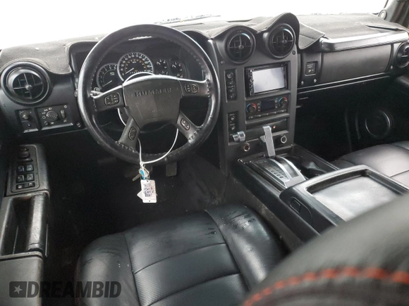 2003 Hummer H2 with VIN 5GRGN23U33H136931, listed as a Copart auction lot 80671794 with 127,137 mi miles and Salvage Title. Bid and sale history available at carsss.com. Image 8.