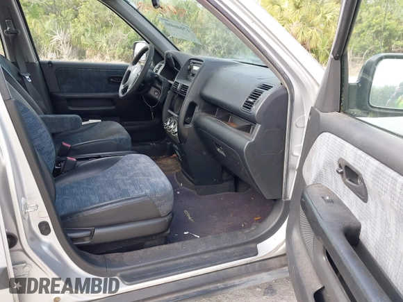2004 Honda CR-V LX with VIN SHSRD68464U202458, listed as a IAAI auction lot 42046480 with 149,343 mi miles and . Bid and sale history available at carsss.com. Image 5.
