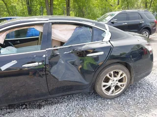 2013 Nissan Maxima SV with VIN 1N4AA5AP4DC801955, listed as a IAAI auction lot 42341827 with 180,982 mi miles and . Bid and sale history available at DreamBid. Image 6.