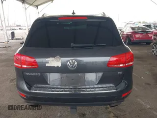 2014 Volkswagen Touareg Sport with VIN WVGEF9BP0ED015273, listed as a IAAI auction lot 42046823 with 84,694 mi miles and . Bid and sale history available at DreamBid. Image 16.