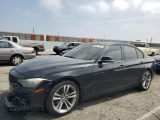 2014 BMW 3 Series 328i with VIN WBA3C1C59EK117019, listed as a Copart auction lot 60692285 with 154,867 mi miles and Salvage title. Bid and sale history available at DreamBid. Image 1.