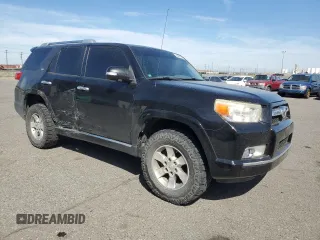 2011 Toyota 4Runner Trail with VIN JTEBU5JR7B5039144, listed as a Copart auction lot 55885955 with 182,980 mi miles and Salvage title. Bid and sale history available at DreamBid. Image 4.