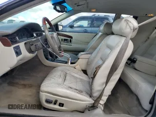 2000 Cadillac Eldorado z VIN 1G6EL12Y7YB703863, wystawiony jako Copart lot #85433244 z przebiegiem 175 416 mil mil oraz Szkoda całkowita • Salvage title. Historia ofert i sprzedaży dostępna na DreamBid. Obrazek 7.