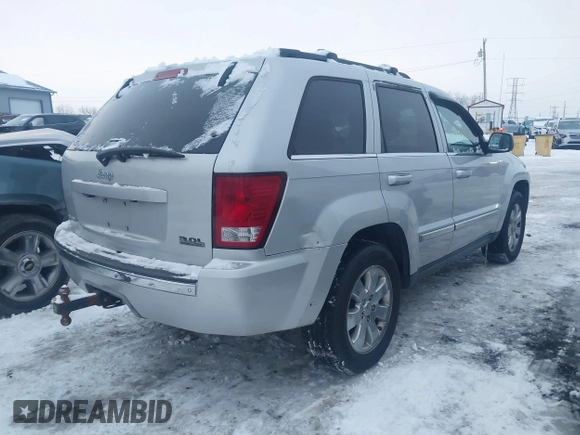 2008 Jeep Grand Cherokee with VIN 1J8HS58M58C117397, listed as a IAAI auction lot 41298484 with 208,095 mi miles and . Bid and sale history available at DreamBid. Image 4.