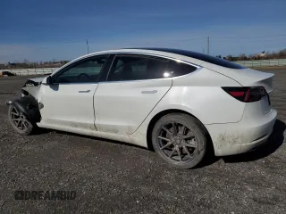 2020 Tesla Model 3 Standard Range Plus z VIN 5YJ3E1EA9LF718478, wystawiony jako Copart lot #52707145 z przebiegiem 111 068 mil mil oraz Szkoda całkowita • Salvage title. Historia ofert i sprzedaży dostępna na DreamBid. Obrazek 2.