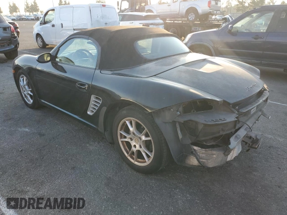 2005 Porsche Boxster z VIN WP0CA29885U711749, wystawiony jako Copart lot #84301684 z przebiegiem 272 856 mil mil oraz Szkoda całkowita • Salvage title. Historia ofert i sprzedaży dostępna na DreamBid. Obrazek 2.