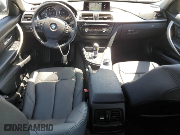 2014 BMW 3 Series 320i with VIN WBA3B1C55EK133687, listed as a Copart auction lot 63049945 with 95,604 mi miles and Salvage title. Bid and sale history available at DreamBid. Image 8.
