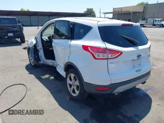 2015 Ford Escape SE z VIN 1FMCU0GX9FUA62790, wystawiony jako IAAI lot #42475851 z przebiegiem 135 697 mil mil oraz . Historia ofert i sprzedaży dostępna na DreamBid. Obrazek 3.