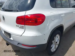 2014 Volkswagen Tiguan S with VIN WVGBV3AX0EW589381, listed as a IAAI auction lot 42186999 with 144,137 mi miles and . Bid and sale history available at DreamBid. Image 17.