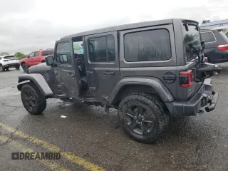 2020 Jeep Wrangler Unlimited Sahara Altitude with VIN 1C4HJXEM5LW293741, listed as a Copart auction lot 58801565 with 97,460 mi miles and Salvage title. Bid and sale history available at DreamBid. Image 2.