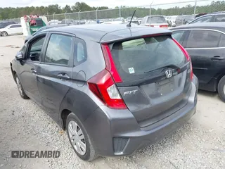 2016 Honda Fit LX with VIN JHMGK5H58GX034743, listed as a IAAI auction lot 42113760 with 98,283 mi miles and . Bid and sale history available at DreamBid. Image 3.