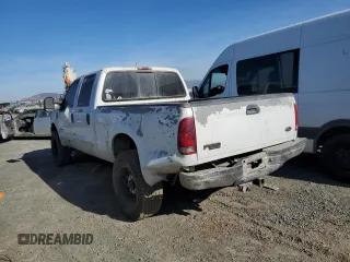2002 Ford F-250 XL with VIN 1FTNW20F12EA44390, listed as a Copart auction lot 83888084 with 285,250 mi miles and Salvage Title. Bid and sale history available at DreamBid. Image 2.
