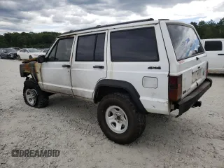 1992 Jeep Cherokee SE with VIN 1J4FJ28S1NL154354, listed as a Copart auction lot 71081634 with 0 mi miles and Salvage Title. Bid and sale history available at carsss.com. Image 2.