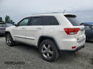 2011 Jeep Grand Cherokee Overland with VIN 1J4RR6GT9BC696319, listed as a Copart auction lot 56914185 with 211,661 mi miles and Salvage title. Bid and sale history available at DreamBid. Image 2.