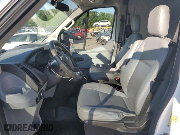 2015 Ford Transit Cargo with VIN 1FTNR2CG1FKA07097, listed as a Copart auction lot 61985765 with 74,100 mi miles and Salvage title. Bid and sale history available at DreamBid. Image 7.