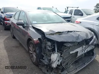 2019 Toyota Camry LE with VIN 4T1B11HK4KU254853, listed as a IAAI auction lot 42013255 with 153,664 mi miles and . Bid and sale history available at DreamBid. Image 1.