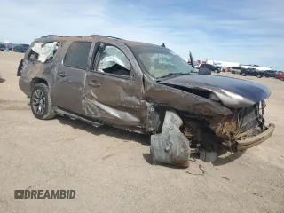 2014 Chevrolet Suburban LT with VIN 1GNSCJE01ER226363, listed as a Copart auction lot 50534915 with 185,731 mi miles and Salvage Title. Bid and sale history available at carsss.com. Image 4.