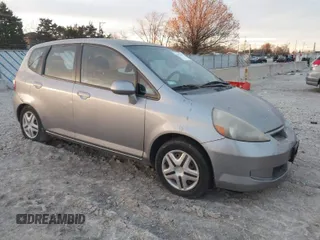 2007 Honda Fit with VIN JHMGD38417S043657, listed as a IAAI auction lot 41025258 with 147,034 mi miles. Bid and sale history available at carsss.com. Image 1.