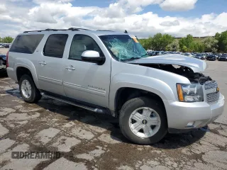 2011 Chevrolet Suburban LT with VIN 1GNSKJE31BR224959, listed as a Copart auction lot 58974345 with Not provided miles and Salvage title. Bid and sale history available at DreamBid. Image 4.