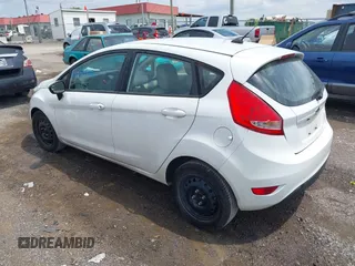 2013 Ford Fiesta S with VIN 3FADP4TJ4DM164594, listed as a IAAI auction lot 42154202 with 75,860 mi miles and . Bid and sale history available at DreamBid. Image 3.