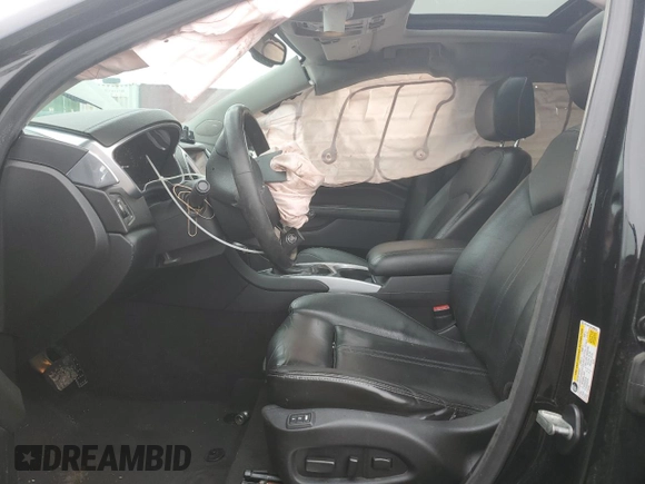 2014 Cadillac SRX Luxury Collection z VIN 3GYFNEE34ES685593, wystawiony jako Copart lot #52202805 z przebiegiem 139 869 mil mil oraz Szkoda całkowita • Salvage title. Historia ofert i sprzedaży dostępna na DreamBid. Obrazek 7.