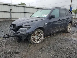 2011 BMW X5 M z VIN 5YMGY0C52BLK26824, wystawiony jako Copart lot #57847845 z przebiegiem 144 217 mil mil oraz Szkoda całkowita • Salvage title. Historia ofert i sprzedaży dostępna na DreamBid. Obrazek 1.
