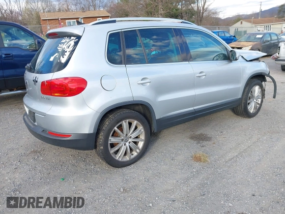 2012 Volkswagen Tiguan SE with VIN WVGAV7AX2CW543003, listed as a IAAI auction lot 41803970 with 187,639 mi miles and . Bid and sale history available at DreamBid. Image 4.