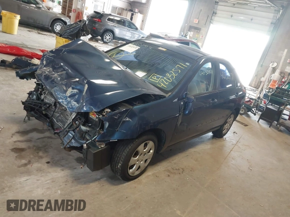 2004 Kia Spectra LX with VIN KNAFE121145012249, listed as a IAAI auction lot 42032571 with 146,748 mi miles. Bid and sale history available at carsss.com. Image 18.