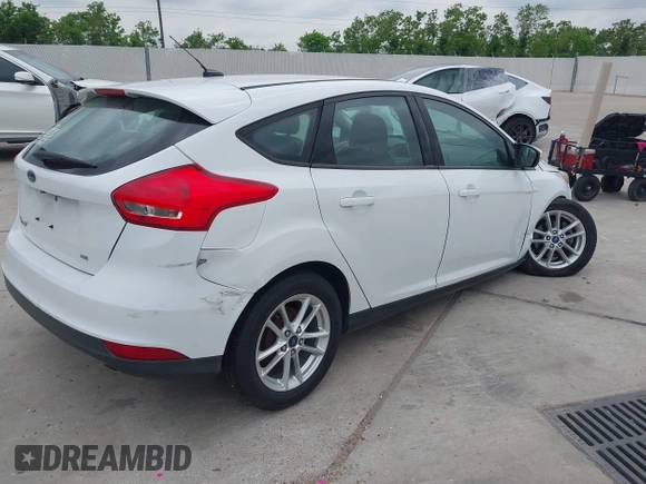 2016 Ford Focus SE with VIN 1FADP3K22GL294626, listed as a IAAI auction lot 42044350 with 70,077 mi miles and . Bid and sale history available at carsss.com. Image 4.