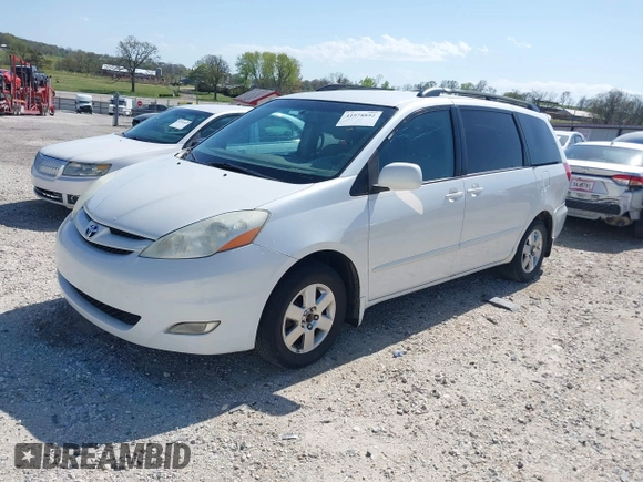 2006 Toyota Sienna XLE with VIN 5TDZA22C06S576958, listed as a IAAI auction lot 41978892 with 257,598 mi miles. Bid and sale history available at carsss.com. Image 18.