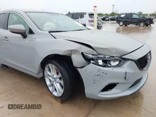 2016 Mazda 6 i Touring with VIN JM1GJ1V52G1463042, listed as a IAAI auction lot 42369747 with 136,849 mi miles and . Bid and sale history available at DreamBid. Image 18.