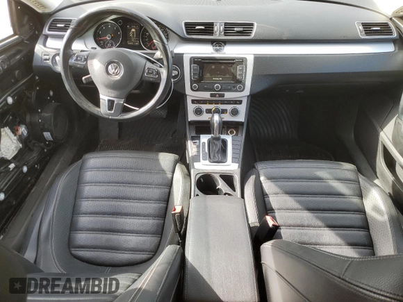 2015 Volkswagen CC Sport with VIN WVWBN7AN4FE814712, listed as a Copart auction lot 48027705 with 102,477 mi miles and Salvage Title. Bid and sale history available at DreamBid. Image 8.