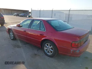 2003 Cadillac Seville Luxury SLS z VIN 1G6KS54Y33U252938, wystawiony jako IAAI lot #41767653 z przebiegiem 145 346 mil mil oraz . Historia ofert i sprzedaży dostępna na DreamBid. Obrazek 3.