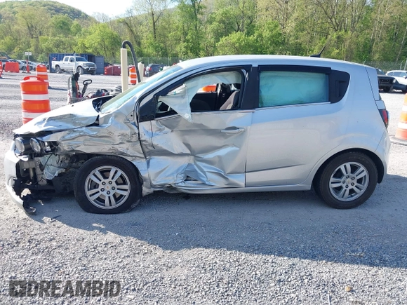 2012 Chevrolet Sonic LT with VIN 1G1JC6SH5C4167574, listed as a IAAI auction lot 42133100 with 59,473 mi miles and . Bid and sale history available at DreamBid. Image 14.
