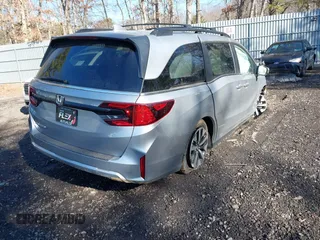 2025 Honda Odyssey EX-L with VIN 5FNRL6H64SB016104, listed as a IAAI auction lot 41456550 with 61 mi miles and . Bid and sale history available at DreamBid. Image 4.